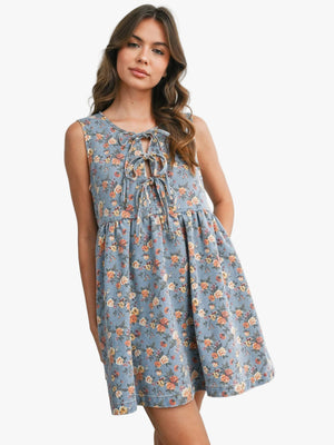 Woman wearing a floral dress on a white background