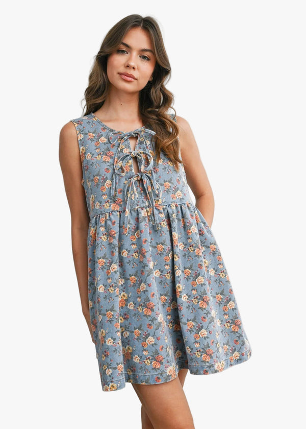 Woman wearing a floral dress on a white background