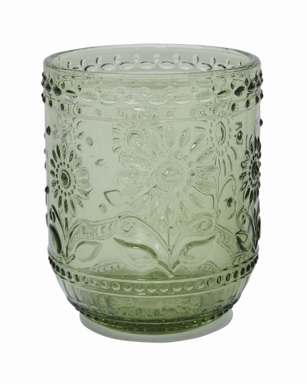 A round green-colored embossed drinking glass with floral patterns.