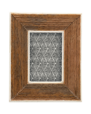 Hand-carved mango wood photo frame with a geometric ribbed pattern, designed to hold a 2x3 photo.