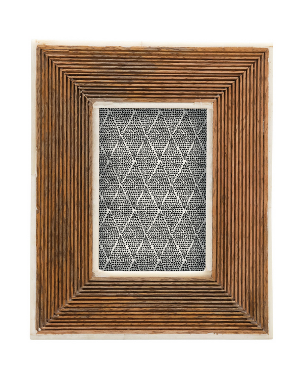 Hand-carved mango wood photo frame with a geometric ribbed pattern, designed to hold a 2x3 photo.